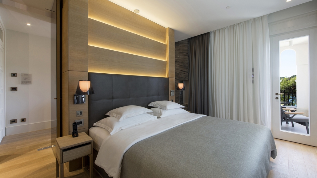 Intimate boutique hotel bedroom with unique design touches